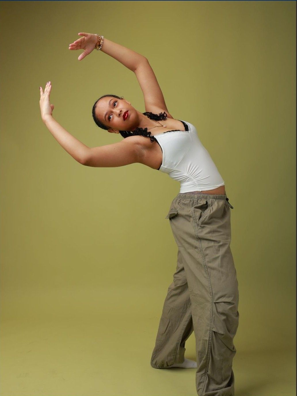 Dynamic dance pose studio portrait